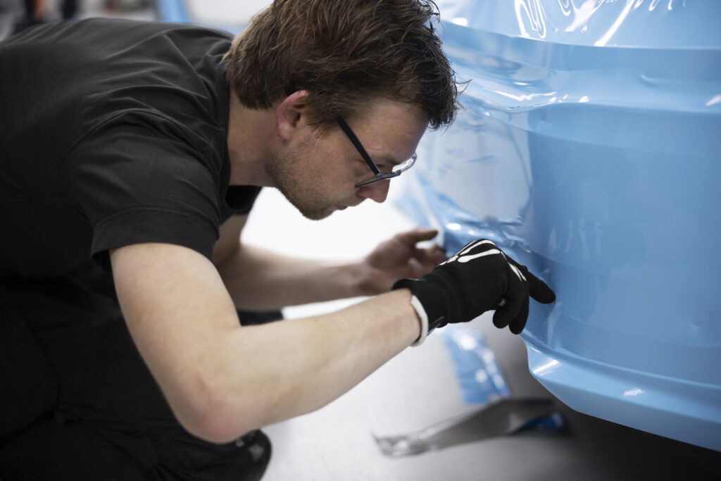 plastic in automotive manufacturing replacing metal parts